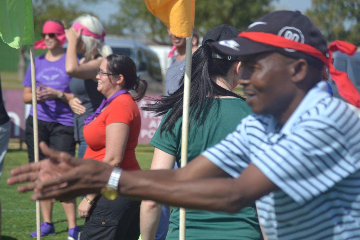 Colleagues cheering during a team game